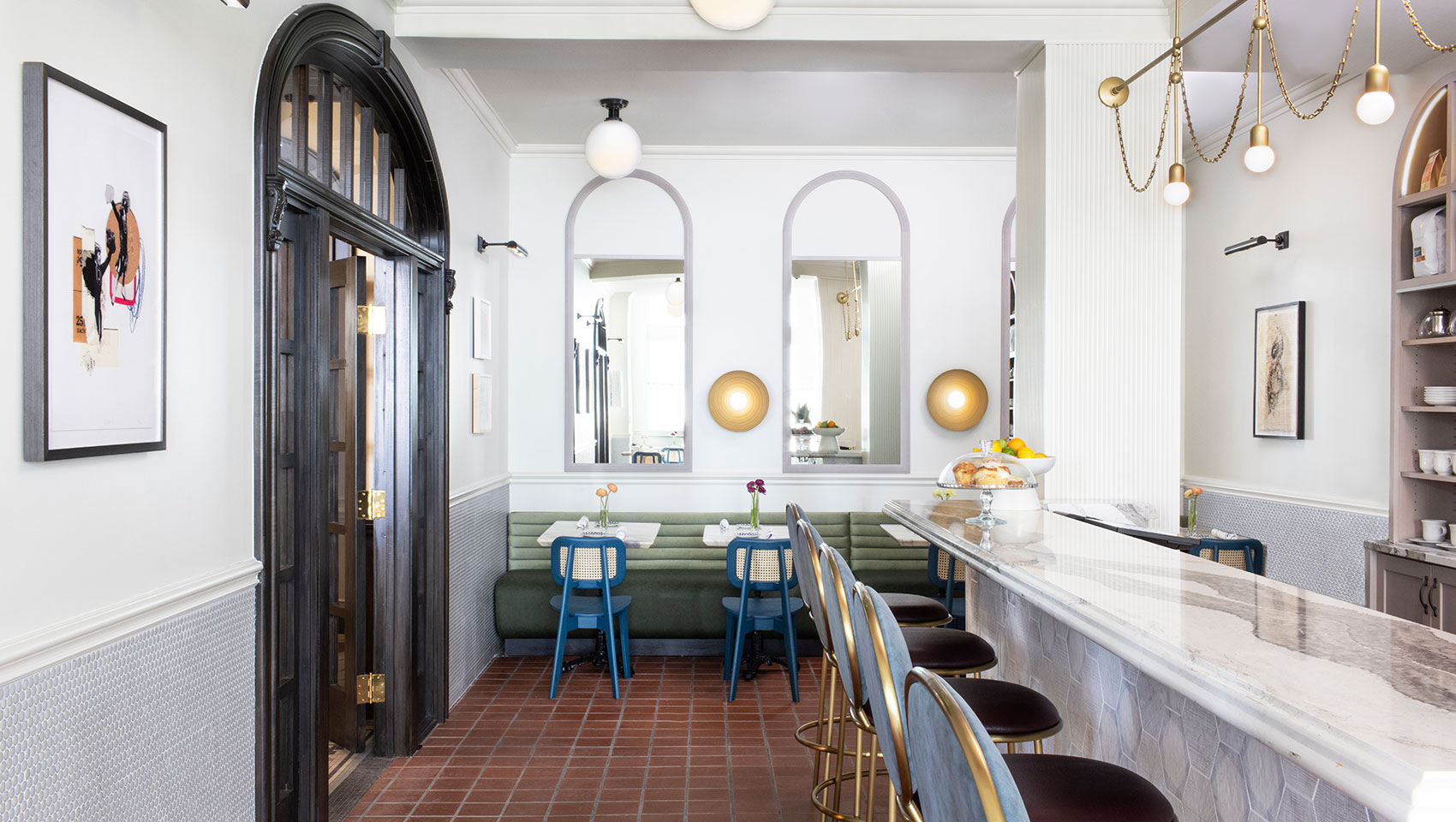 cafe at cottonwood hotel with tables and a coffee bar