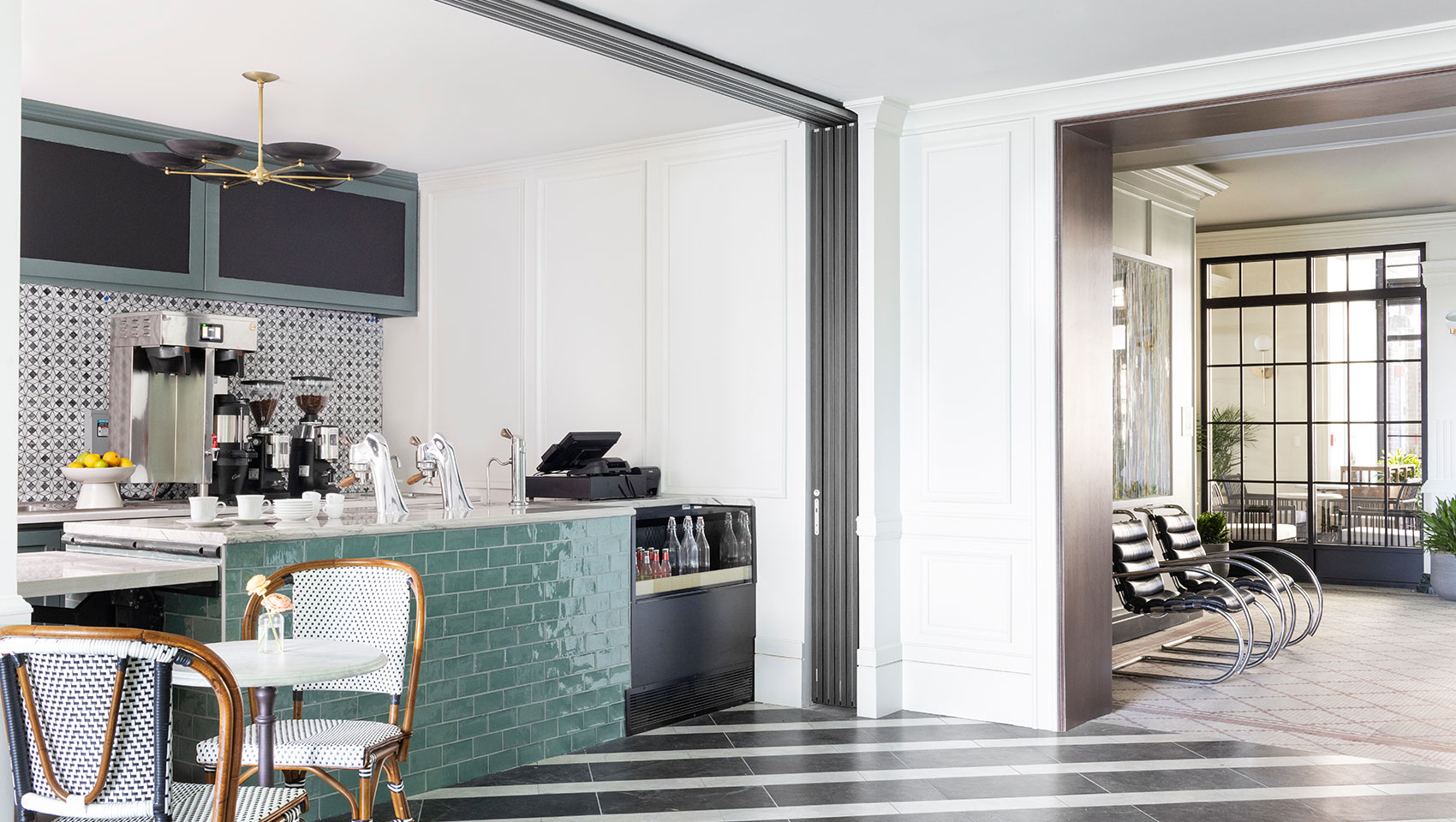 garden lounge hallway with white and black floor and green walls